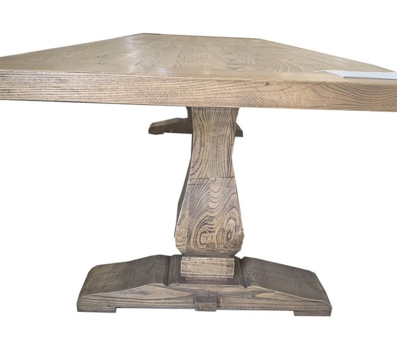 A rustic reclaimed elm dining table with a double pedestal base, measuring 300cm, perfect for gatherings of up to 8 diners.