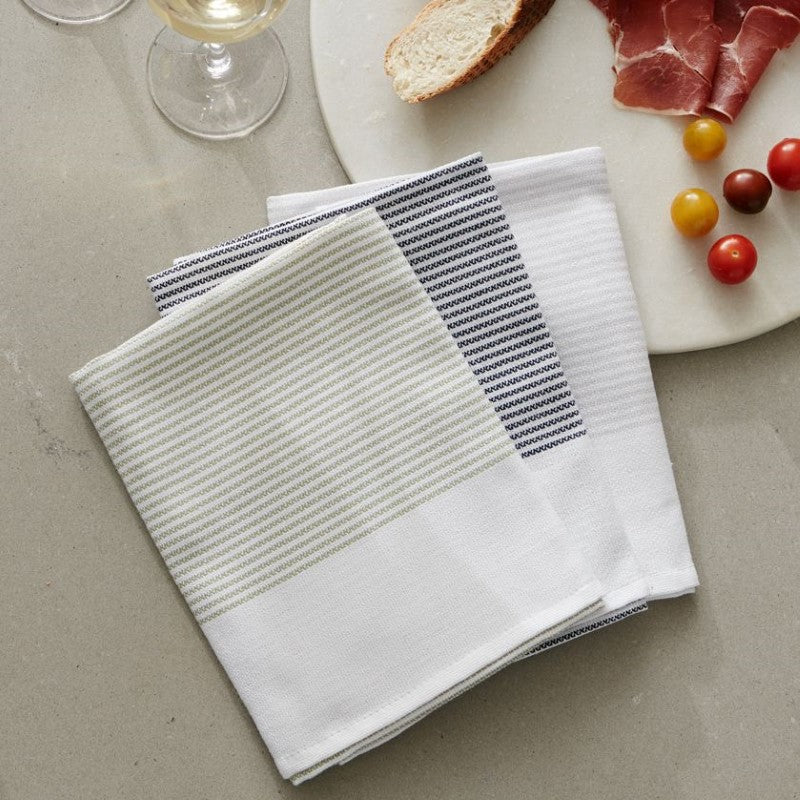 Set of three absorbent lint-free tea towels in Pebble, Ash, and Moss colors, made from OEKO-TEX® Certified cotton.