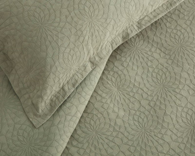 Elegant olive green geometric bedspread set with two pillowcases, made from 100% cotton, ethically crafted in Portugal.