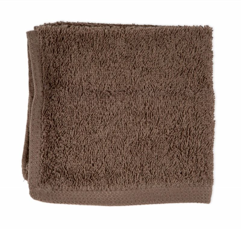 Plush walnut bath mat crafted from 100% cotton, offering softness, absorbency, and elegance for any bathroom setting.