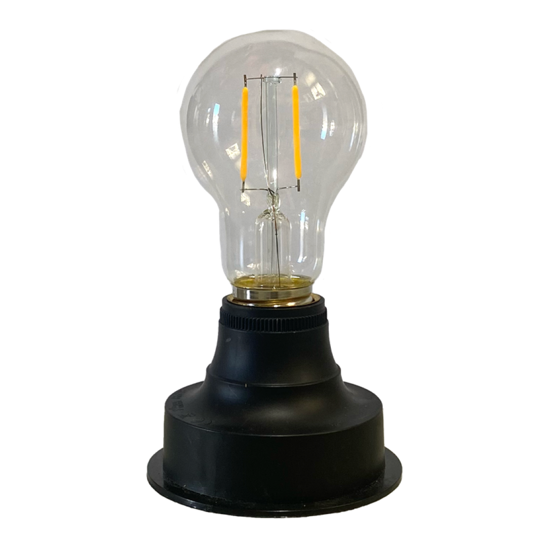 Set of 4 LED light bulbs, 9 x 9 x 16cm, energy-efficient, warm glow, ideal for home or office lighting.