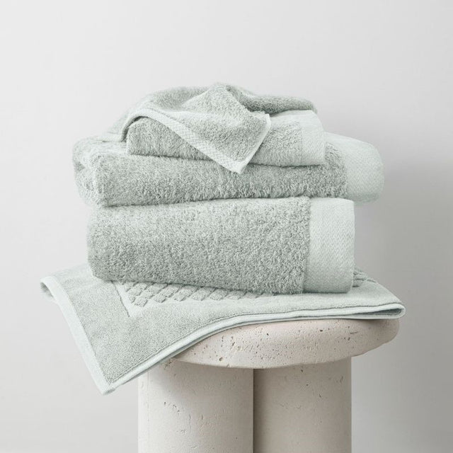 Sea foam bamboo bath mat (51 x 76cm) offers absorbency and softness, perfect for sensitive skin, eco-friendly and stylish.