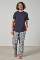 Casual PJ set featuring a soft t-shirt and elasticated pants with pockets, made from certified cotton in Small size.