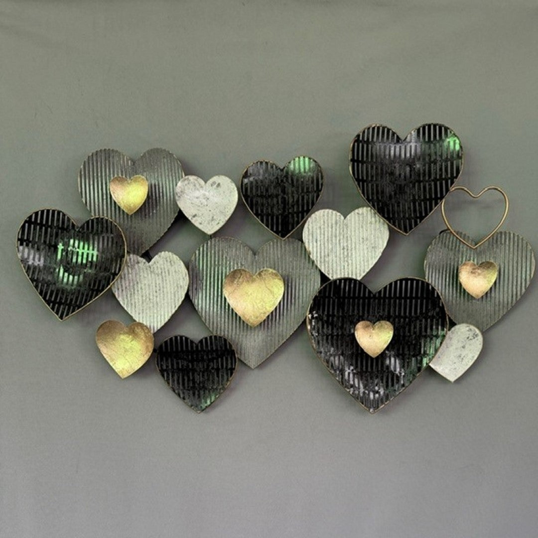 Elegant wall art featuring black and gold hearts, measuring 90 x 50cm, perfect for enhancing modern and chic interiors.