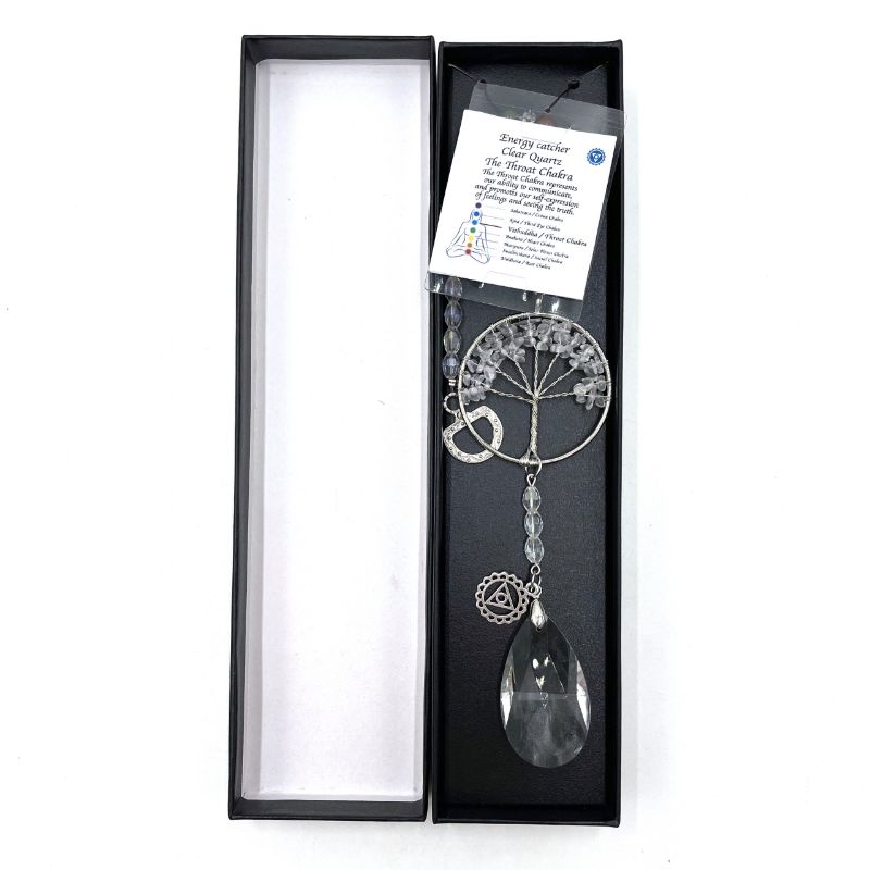 Suncatcher featuring Tree of Life design, made of clear quartz to enhance throat chakra and reflections, measuring 32.5cm.
