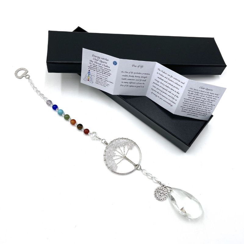 Clear quartz suncatcher featuring the Tree of Life design, enhancing decor and promoting throat chakra healing (32.5cm).