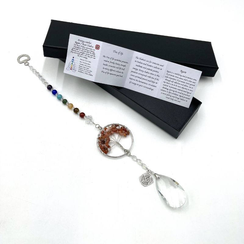 Suncatcher featuring a Tree of Life design with Root Chakra Agate, promoting stability and colorful reflections.