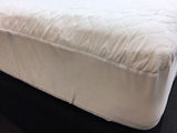 Quilted waterproof mattress protector in queen size, featuring soft polyester fill, elastic corners, and machine washable durability.