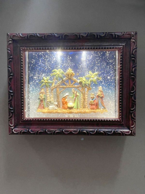 Framed Nativity artwork featuring the Holy Family, perfect for festive decor and meaningful gifts during Christmas.