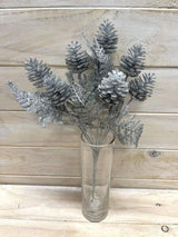 Silver artificial glitter pine cone bush, perfect for holiday decor and floral arrangements, adds winter whimsy and elegance.