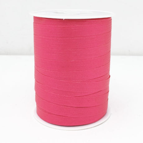 Cerise curling ribbon, 10mm wide and 250m long, perfect for wrapping gifts and crafting projects.