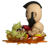 Vinyl figurine of Zangief from Street Fighter, showcasing his dynamic slam move and intricate muscular details.