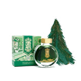 Ferris Wheel Press Misguided Mistletoe fountain pen ink in a 38ml bottle, rich green hue, with brass cap and collectible design.