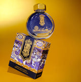 Bottle of Ferris Wheel Press Crystal Blue Legacy fountain pen ink, shimmering navy hue, ideal for writing and artistry.