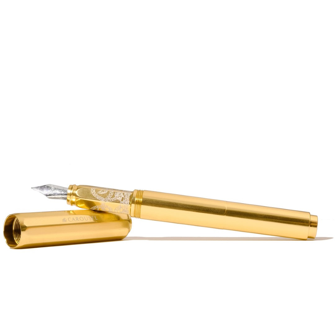 Ferris Wheel Press fine fountain pen featuring a gold-tressed aluminium body with a carousel design for elegant writing.