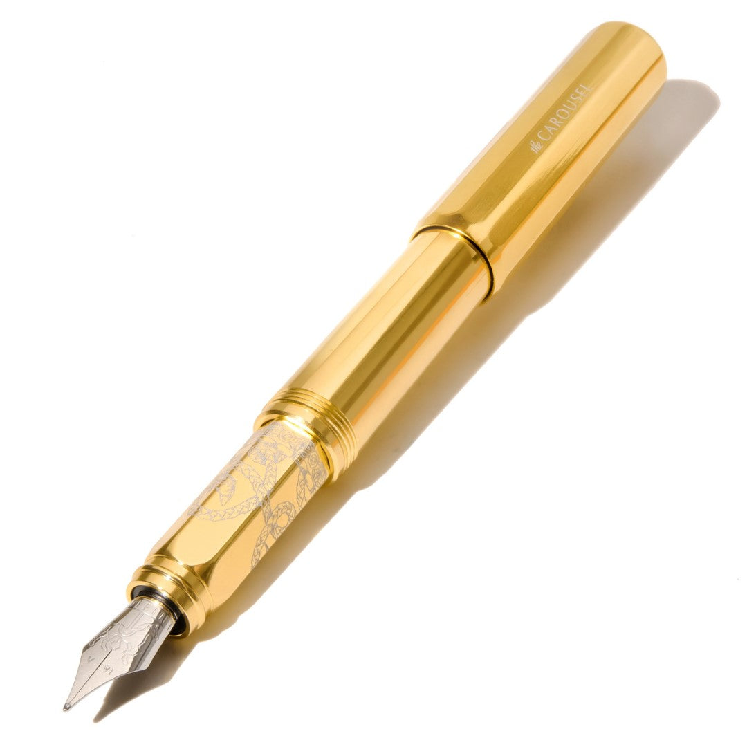 Ferris Wheel Press fountain pen featuring an aluminium body with carousel design and plaited gold tress for elegant writing.