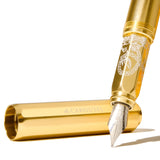 Ferris Wheel Press Fountain Pen in Aluminium Carousel finish with plaited gold tress, perfect for smooth, elegant writing.