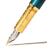 Elegant Ferris Wheel Press Fountain Pen in Bijou Printmaker's Teal Fine, ideal for writing and drawing with precision.