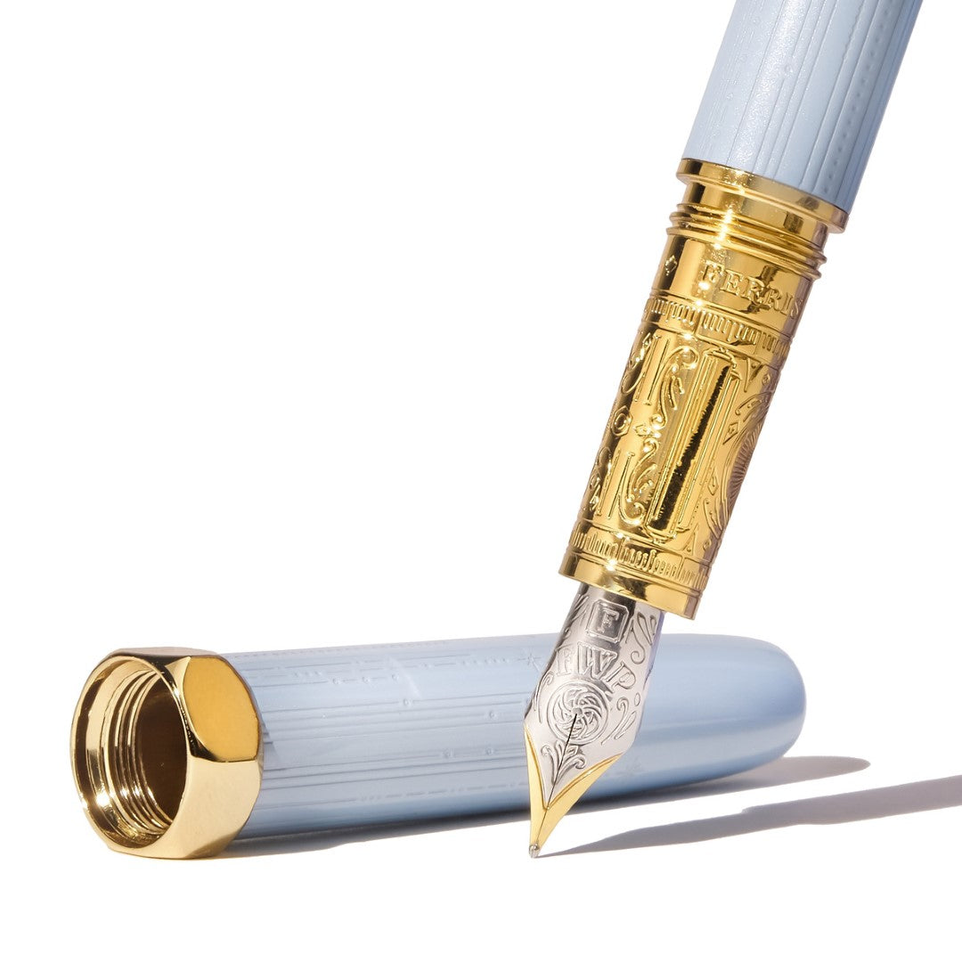 Elegant Ferris Wheel Press fountain pen in "Forget Me Not" design with medium nib for smooth, vibrant writing.