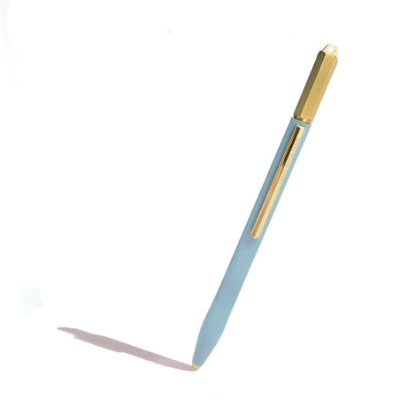 Elegant copper ballpoint pen with a rotating brass crown, perfect for smooth writing and stylish everyday use.