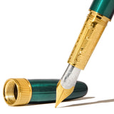 Ferris Wheel Press Joule Fountain Pen in Teal, featuring brass construction, gold plating, and a smooth two-tone nib.