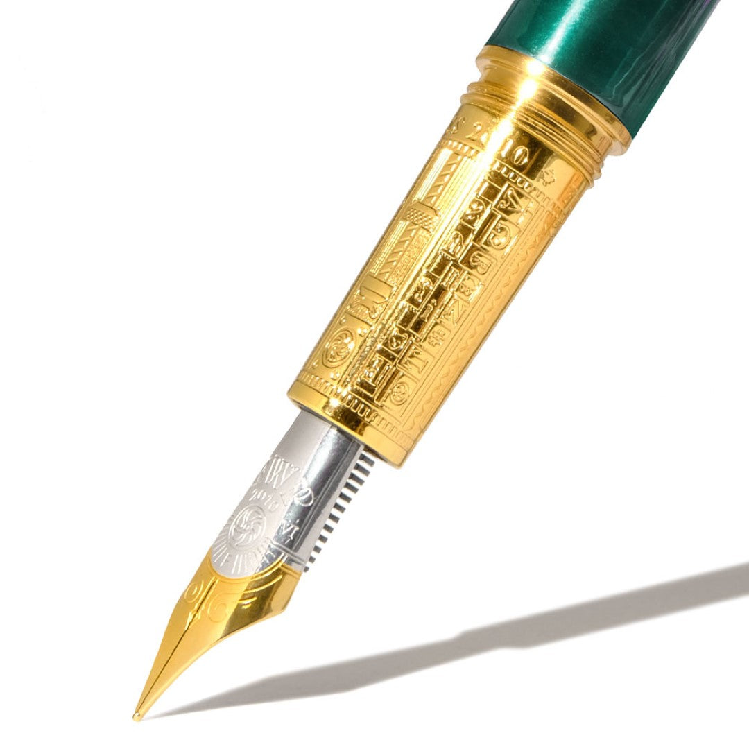 Ferris Wheel Press Joule Fountain Pen in teal with gold accents, featuring a smooth two-tone nib and leather carrying sleeve.