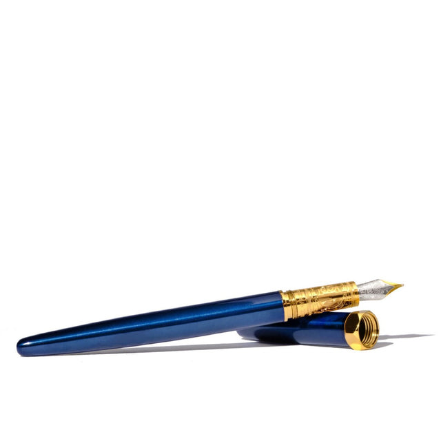 Elegant Ferris Wheel Press Bijou fountain pen in Sapphire Lacquer, featuring a two-tone nib and luxurious brass grip.