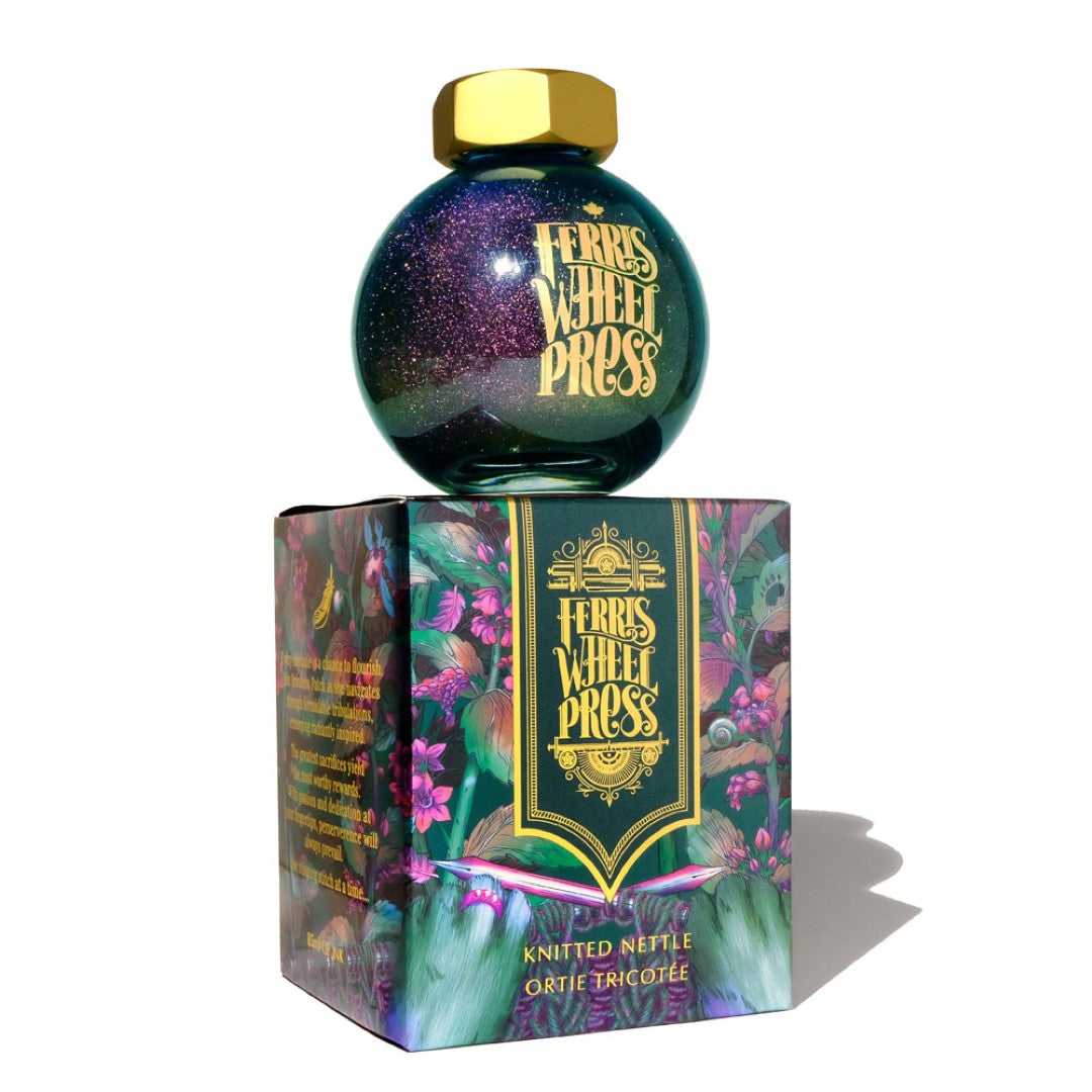 Dark teal fountain pen ink 'Knittled Nettle' with gold and pink shimmer, perfect for creative writing and artistry.