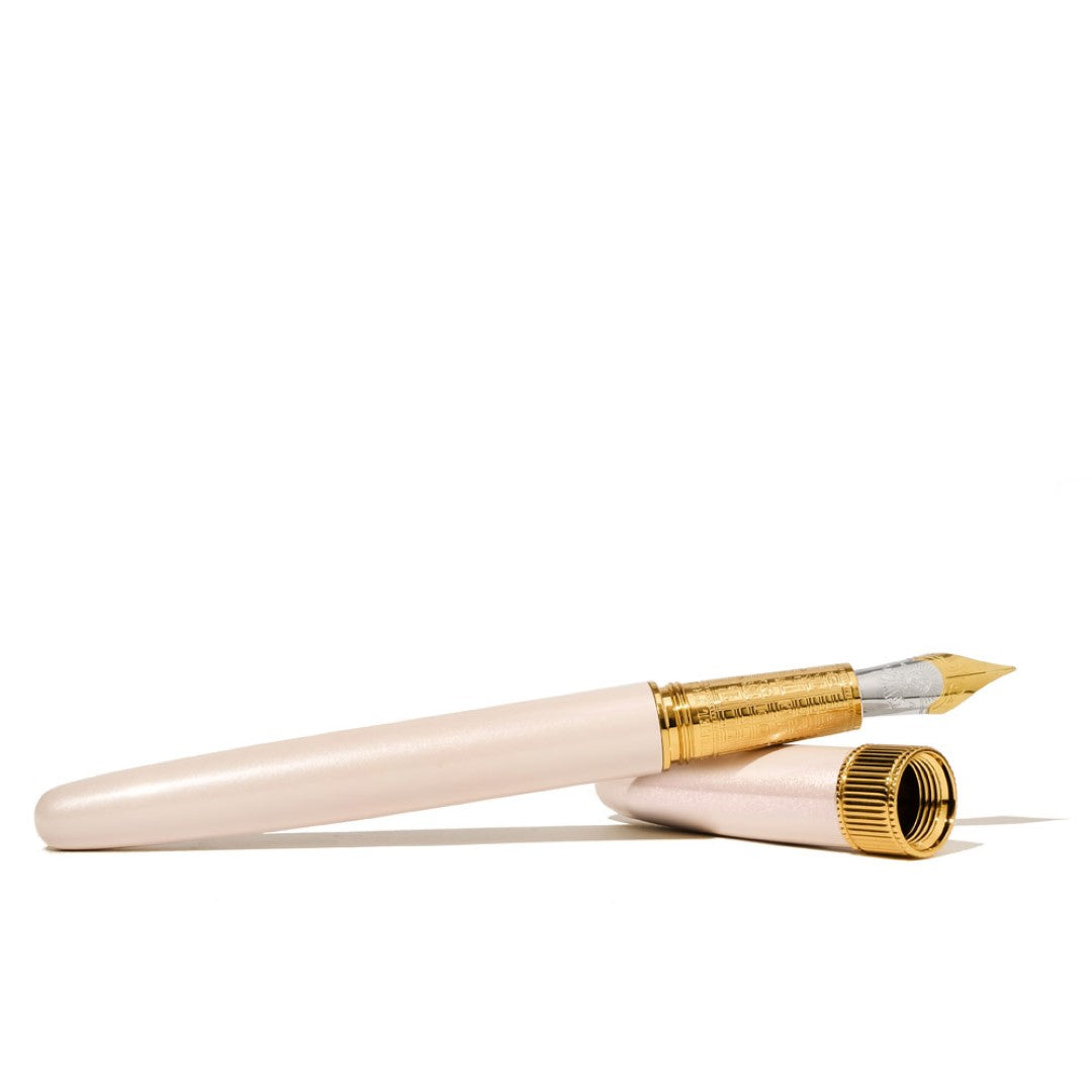 Elegant Ferris Wheel Press Joule fountain pen in Chantilly Lacewood, featuring a gold-plated finish and smooth two-tone steel nib.