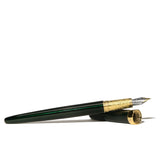 Elegant Ferris Wheel Press Bijou Fountain Pen in emerald green, featuring a two-tone nib and engraved brass grip for refined writing.