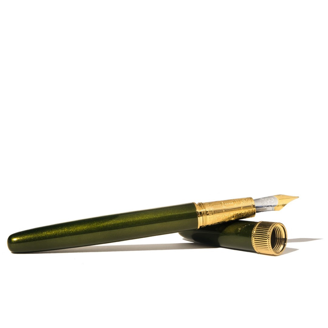 Elegant Ferris Wheel Press Joule Fountain Pen in Juniper Moss Fine with shimmery lacquer finish and gold plating, includes leather sleeve.