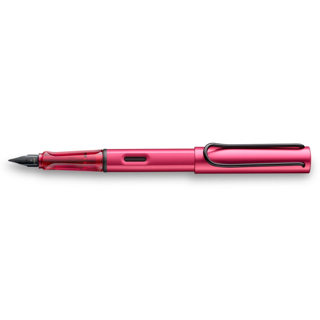 Lamy Al-Star Fiery Red Fountain Pen features a metallic finish, ergonomic grip, and polished steel nib for smooth writing.