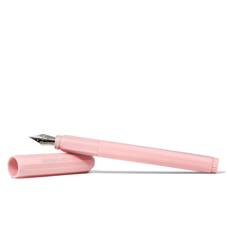 Ferris Wheel Press medium fountain pen in Billowing Blush, featuring a playful horse nib, ideal for elegant writing.