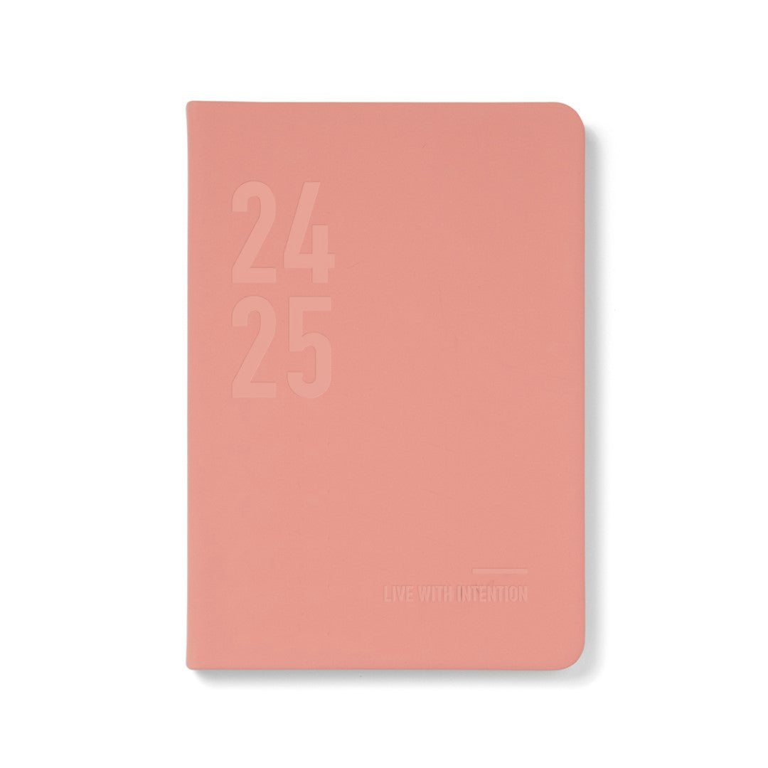 A5 week-to-view diary in Conscious Clay, made from recycled materials, featuring eco-friendly design and monthly quotes.