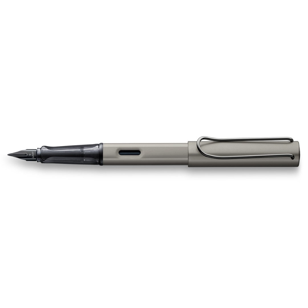 Lamy Lx Fountain Pen in dark grey with ergonomic grip and extra fine nib, elegantly packaged in a designer case.