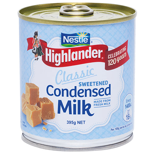 Nestle Highlander Classic Sweetened Condensed Milk 395g, a creamy blend of milk and sugar for enhancing desserts and sweet treats.