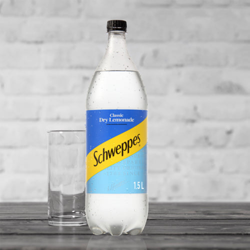 Bottle of Schweppes Classic Dry Lemonade 1.5L, a sparkling beverage with zesty lemon flavor, ideal for any occasion.