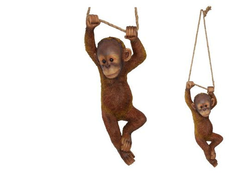 Lifelike hanging orangutan ornament adds exotic charm to home or garden, perfect for animal lovers and unique decor accents.