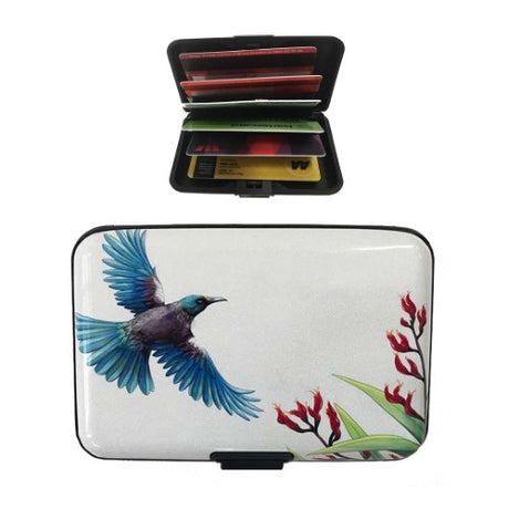 Aluminium cardholder featuring Tui in flight design, RFID blocking, and 6 PVC pockets for 12 cards.