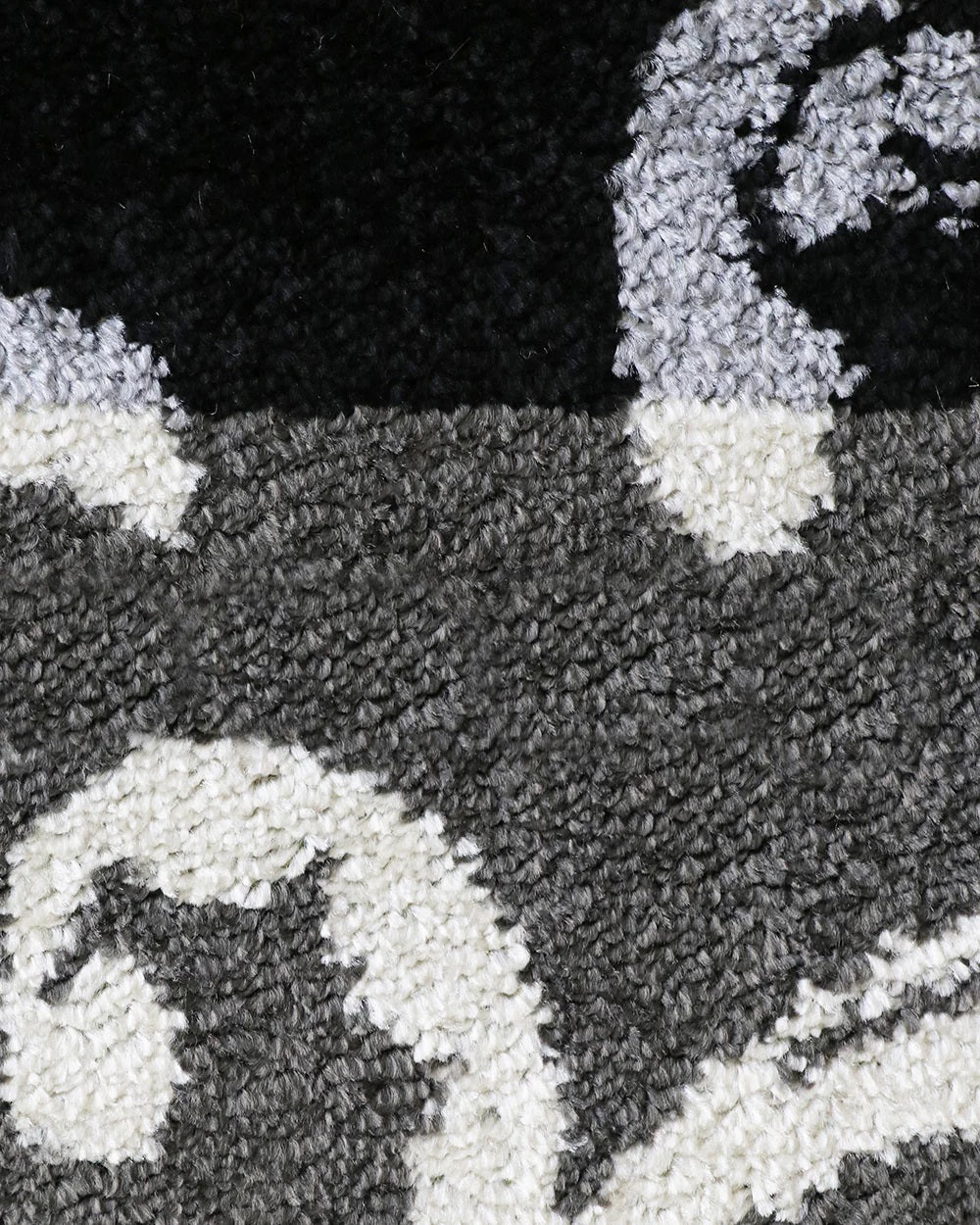 Stylish black and grey multi-patterned floor rug, 160x235cm, made from soft, durable heatset polypropylene.