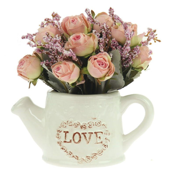 Delicate light pink fabric roses in a charming ceramic watering can, perfect for whimsical home decor. Set of 2.