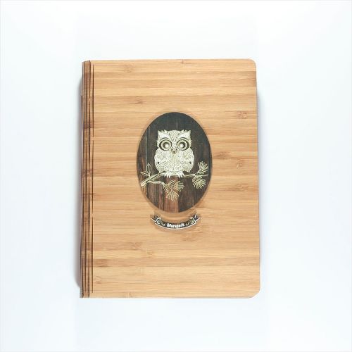 Eco-friendly dark wood bamboo journal with 120 pages, ideal for travel, sketching, or daily notes.