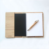 Eco-friendly Bamboo Journal with dark wood Morepork design, 175mm x 230mm, 120 pages of high-quality cartridge paper.