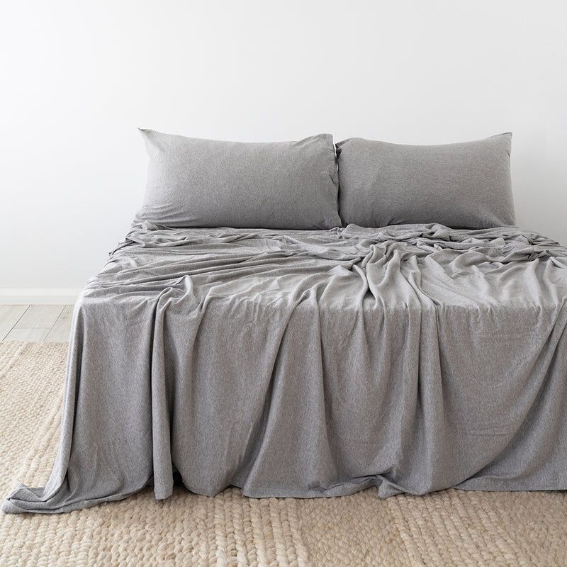 King Single Sheet Set in grey made from organic cotton and Tencel, featuring breathable marle yarn for comfort and sustainability.