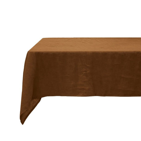 Linen tablecloth in rich Hazel, 150x275cm, crafted from premium French flax for elegant dining experiences.