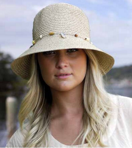 Bohemian bucket sun hat with UPF 50+, adjustable fit, bead trim, and packed for stylish sun protection at 58cm.