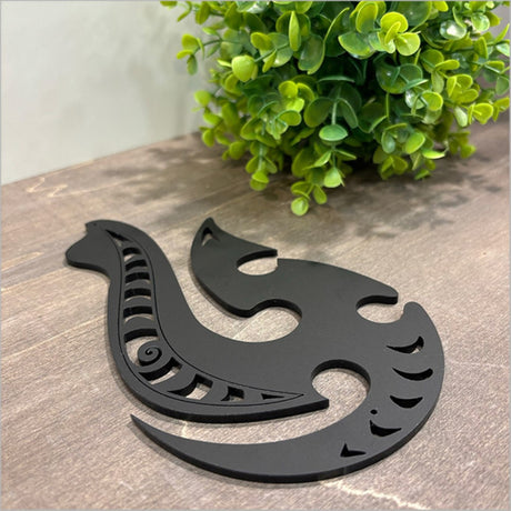 Elegant black acrylic Hei Matau artwork, 200mm x 117mm, symbolizing strength and ocean connection for modern decor.