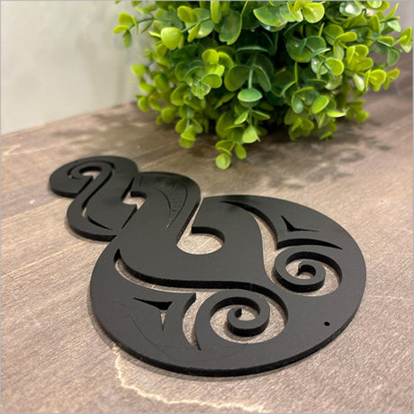 Stylish Pikorua black acrylic wall art, featuring a unique M?ori-inspired design, perfect for modern home decor.