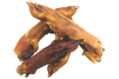 Natural NZ pig trotters for dogs, nutrient-rich chew treats in a bulk pack of 50, promoting dental health and happiness.