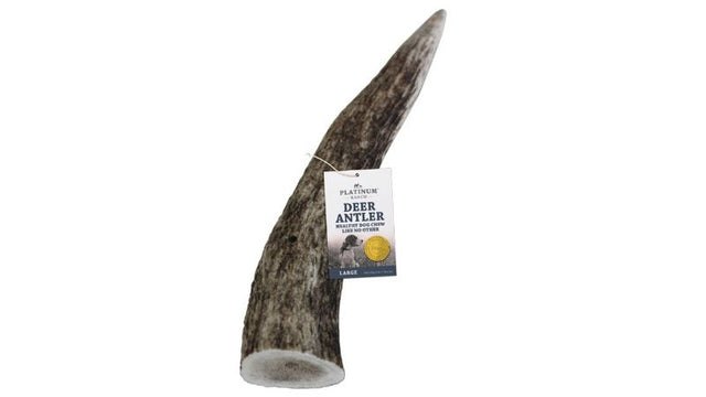 Large deer antler chew treat from New Zealand, rich in vitamins and minerals, promotes dental health for pets.